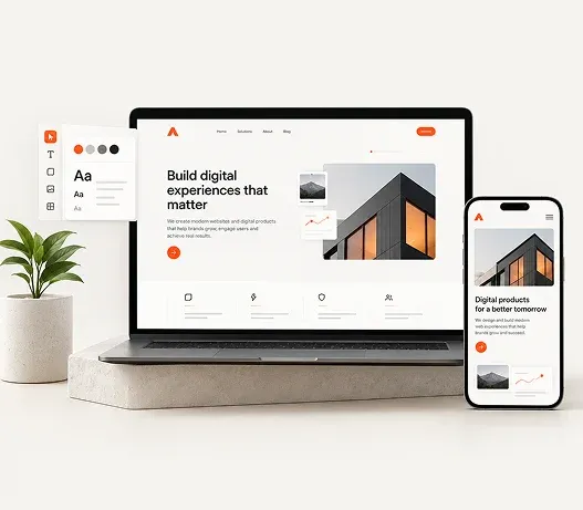 A laptop and a phone showing the same marketing website home page, beside a design tool palette and a potted plant.
